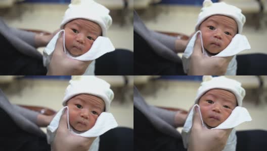 母亲给新生儿喂奶后打嗝高清在线视频素材下载
