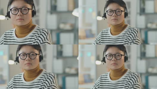 亚洲女性在呼叫中心工作的肖像高清在线视频素材下载