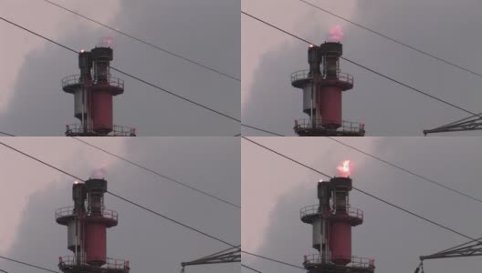 石油工厂有火和烟的烟囱高清在线视频素材下载