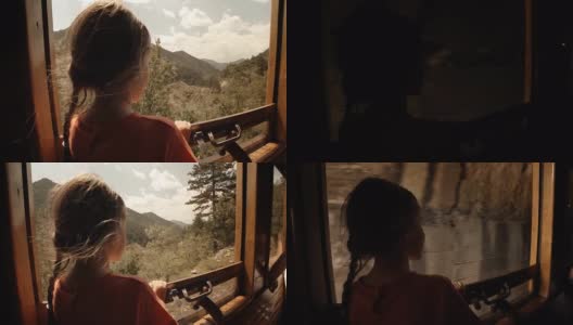 火车上的孩子——一个小女孩享受她的第一次火车旅行。山景窗外。高清在线视频素材下载