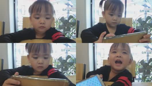 WS:小快乐的孩子用平板电脑。高清在线视频素材下载