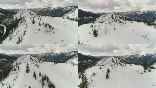 Backcountry Wilderness Mountains Snowmobile Aerial高清在线视频素材下载