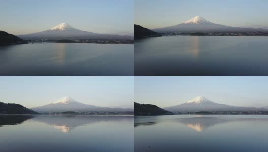 在晴朗晴朗的一天，从川口湖无人机拍摄的富士山高清在线视频素材下载