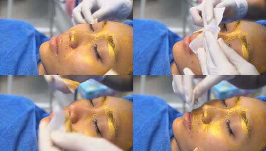 抗衰老面部护理与霜按摩在女人的脸上高清在线视频素材下载