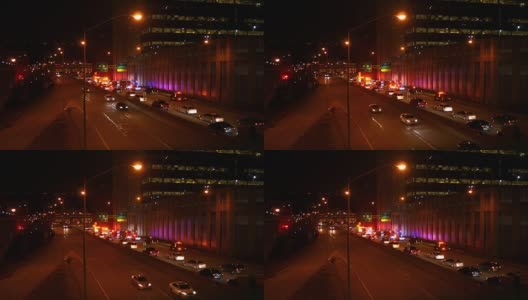 夜间，在城市出入口车道上，车辆试图绕过高速公路相撞事故高清在线视频素材下载