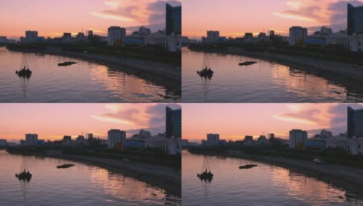 越南胡志明市西贡河- 2015年11月:亚洲城日落高清在线视频素材下载