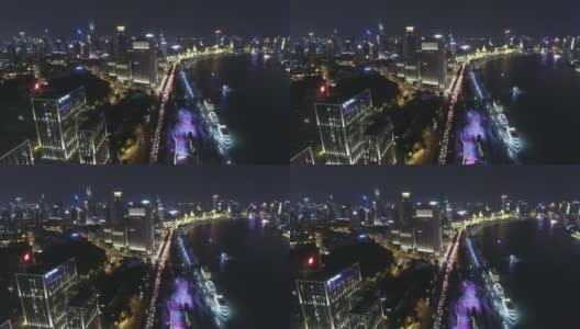 航拍黄浦江上的船只夜间航行/中国上海高清在线视频素材下载