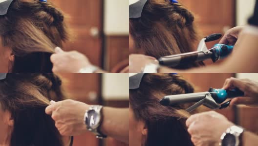 亚洲妇女与长头发和发型师与发铁做头发。高清在线视频素材下载