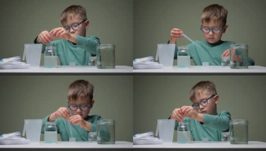 戴眼镜的男孩在室内用吸管和液体做化学实验。学习，有兴趣地学习。选择教育。研究背景。成功学习的个人素质高清在线视频素材下载