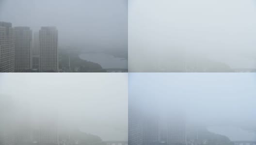 雾气笼罩的湖边公寓的时间流逝高清在线视频素材下载