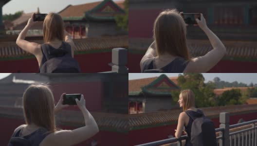 慢镜头斯坦尼康拍摄的一个年轻女子旅行博客访问紫禁城-中国皇帝的古代宫殿高清在线视频素材下载