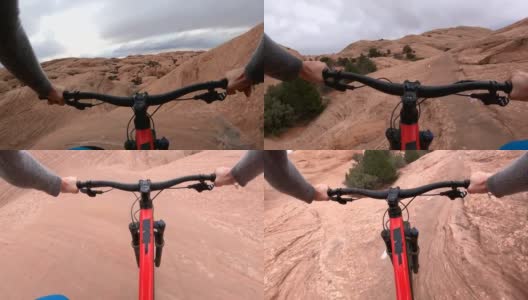山地自行车沙漠通道的第一人称视角，越过岩石高清在线视频素材下载