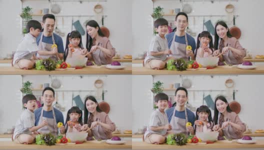 健康家庭的肖像享受闲暇时间学习烹饪素食。高清在线视频素材下载