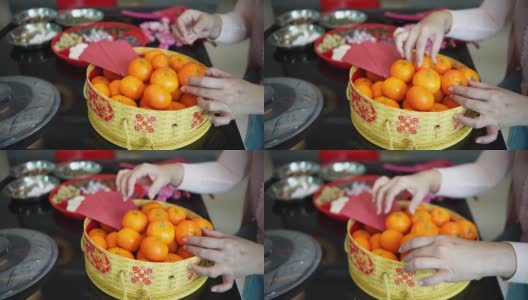 在春节期间从盒子里拿一个橘子高清在线视频素材下载
