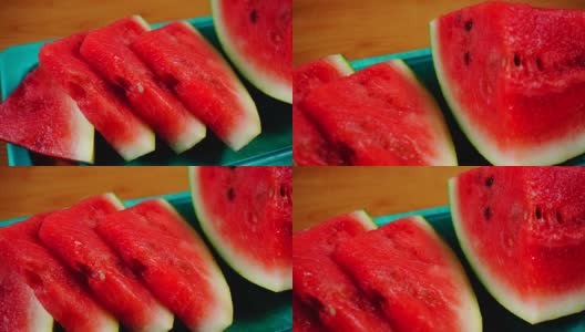 红色西瓜切片水果在绿色板4K高清在线视频素材下载
