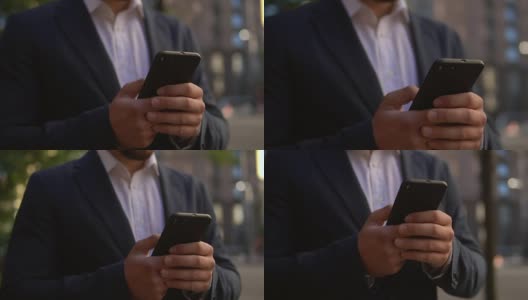 男人们在街上用手机聊天高清在线视频素材下载