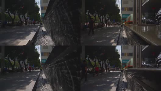 阳光明媚的一天深圳城市人行道喷泉慢镜头全景4k中国高清在线视频素材下载