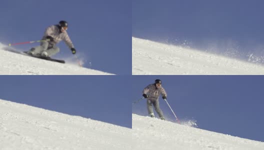 滑雪者下坡和飘雪的慢动作高清在线视频素材下载