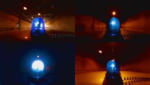 带蓝色应急灯的汽车通过隧道高清在线视频素材下载