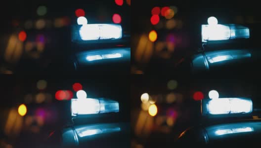夜间城市道路上的警车高清在线视频素材下载