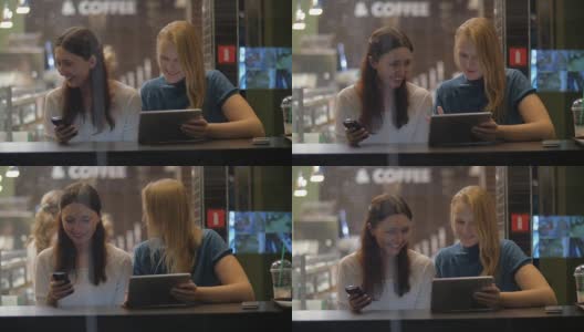 女性朋友与pad在咖啡馆娱乐高清在线视频素材下载