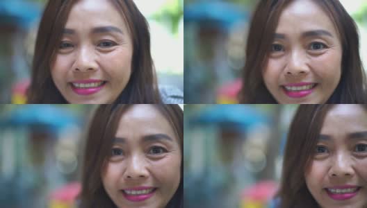 面部表情由亚洲成熟女性，微笑的脸高清在线视频素材下载