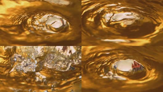 液体黄金在戏剧性的特写慢动作高清在线视频素材下载