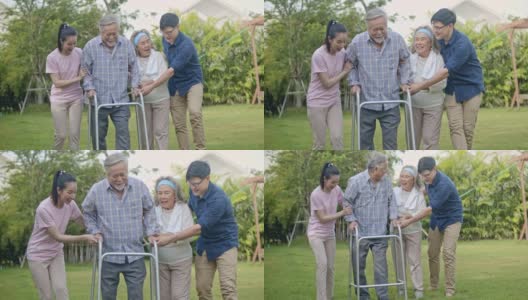 老人用移动步行者与幸福的家庭，慢镜头高清在线视频素材下载