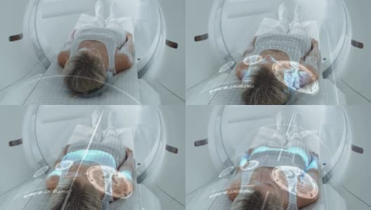躺在CT或PET或MRI扫描床上的女性患者，在机器扫描她的大脑和重要参数时移动。医用实验室高科技设备的视觉特效增强现实概念。高清在线视频素材下载