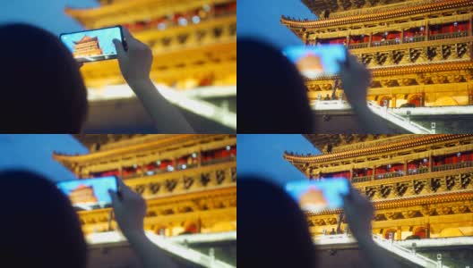 游客们在西安拍摄鼓楼高清在线视频素材下载
