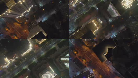 青岛市夜间时间照亮市中心屋顶、交通街道高空俯视图4k中国高清在线视频素材下载