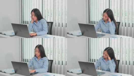亚洲女性在工作中感到压力和疲惫高清在线视频素材下载