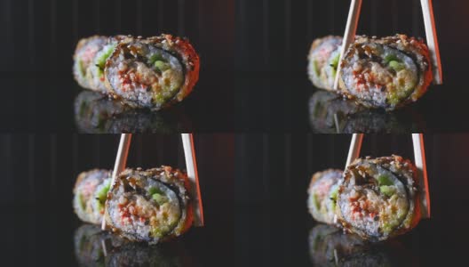 用筷子夹鳗鱼的美味天妇罗卷特写高清在线视频素材下载