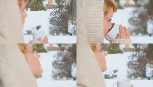 戴头巾的女孩在窗边喝茶，享受冬天高清在线视频素材下载