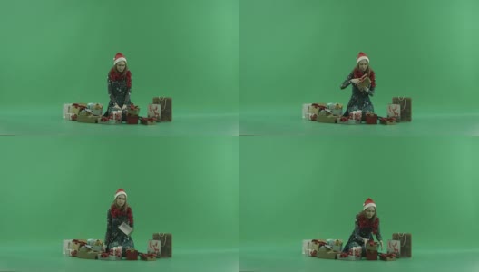 这位年轻女士收到了一个空的圣诞礼物盒，背景是色度键高清在线视频素材下载