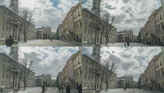 乌克兰利沃夫- 2018冬季:乌克兰利沃夫老城中心。在市政厅附近的市场广场(Ploshcha Rynok)移动的人们的时间流逝。云移动得很快。高清在线视频素材下载
