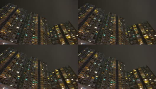 夜间照明香港城市公寓大楼上视野全景4k时间间隔高清在线视频素材下载