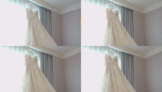 婚纱摄影在婚礼当天挂在窗户上高清在线视频素材下载