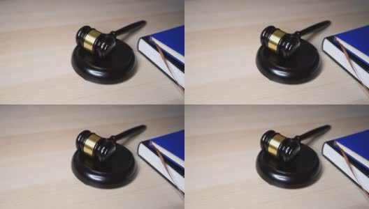 桌子上放着法官的木槌，关于正义的概念画面高清在线视频素材下载