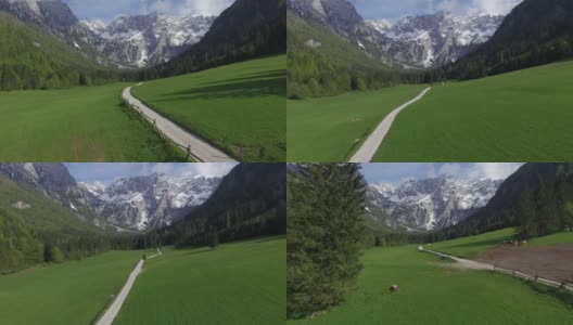 航拍沿着斯洛文尼亚阿尔卑斯山乡村公路高清在线视频素材下载