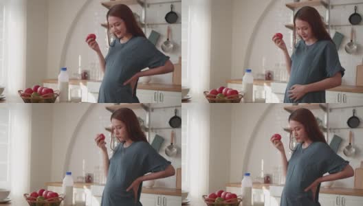 孕妇在吃苹果高清在线视频素材下载
