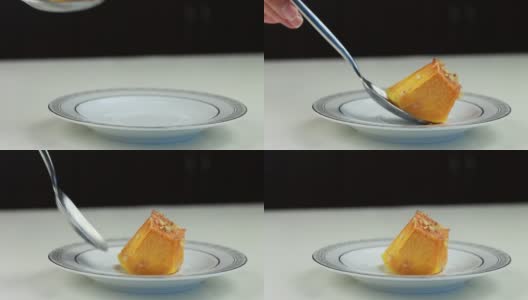 厨师把南瓜甜点放在碟子上。高清在线视频素材下载