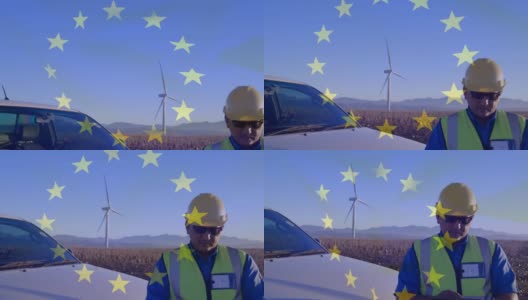 动画欧盟旗帜在工程师使用平板电脑和风力涡轮机在现场高清在线视频素材下载