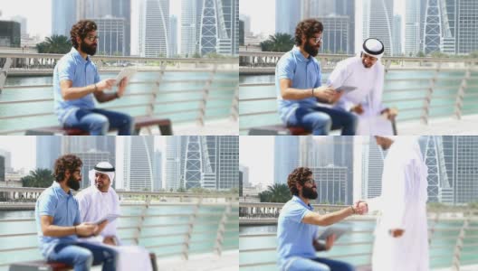 迪拜——年轻人在城市中使用数字平板电脑高清在线视频素材下载