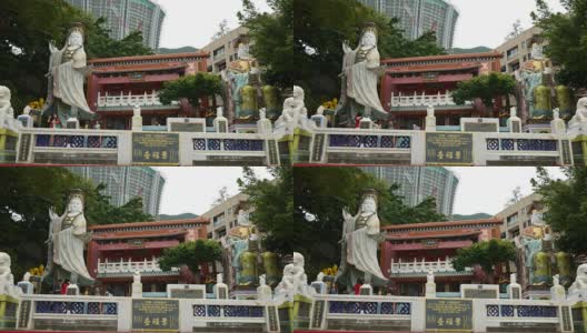 中国香港——2015年10月11日:位于浅水湾东南端的Kwum Yam道教圣地。-天后庙及浅水湾高清在线视频素材下载