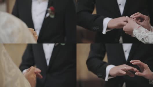 新娘和新郎交换结婚戒指的特写高清在线视频素材下载