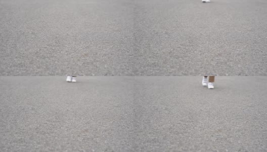 Close-up of a feet women walking on asphalt高清在线视频素材下载