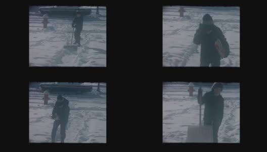 小男孩在暴风雪后在人行道上铲盐高清在线视频素材下载