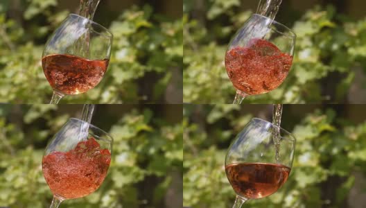 粉红葡萄酒倒进酒杯，4K慢镜头高清在线视频素材下载