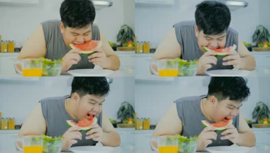 胖子吃西瓜吃得很快。高清在线视频素材下载